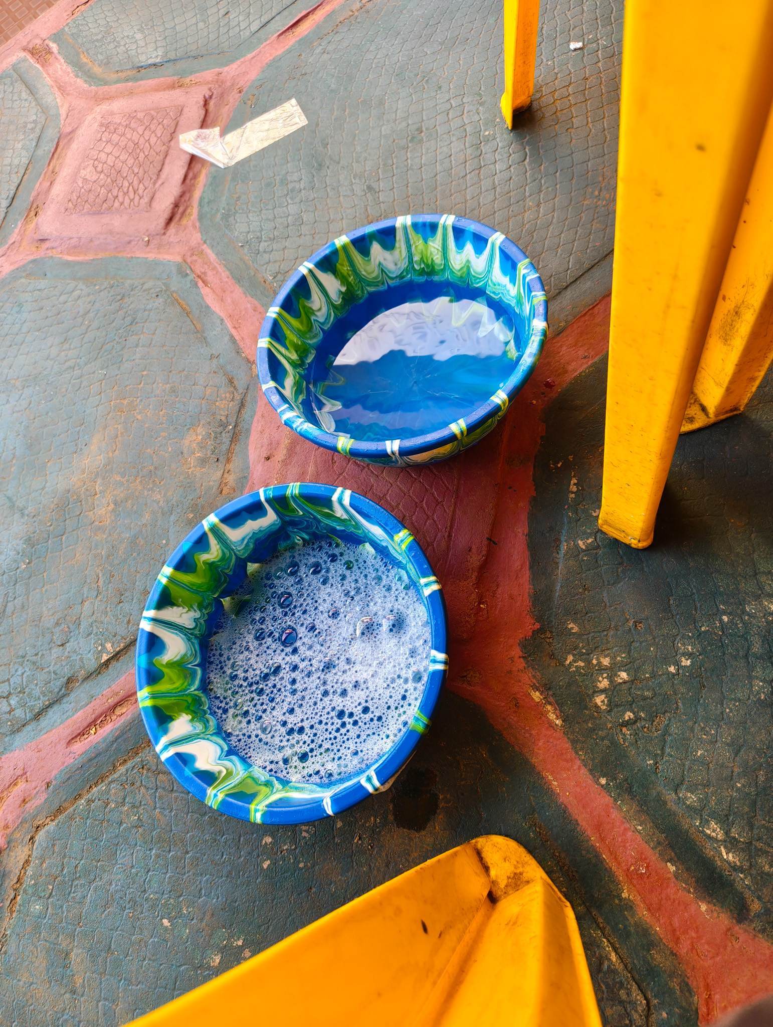 How to wash hands at restaurants in Guinea. One had soap, the other didn't