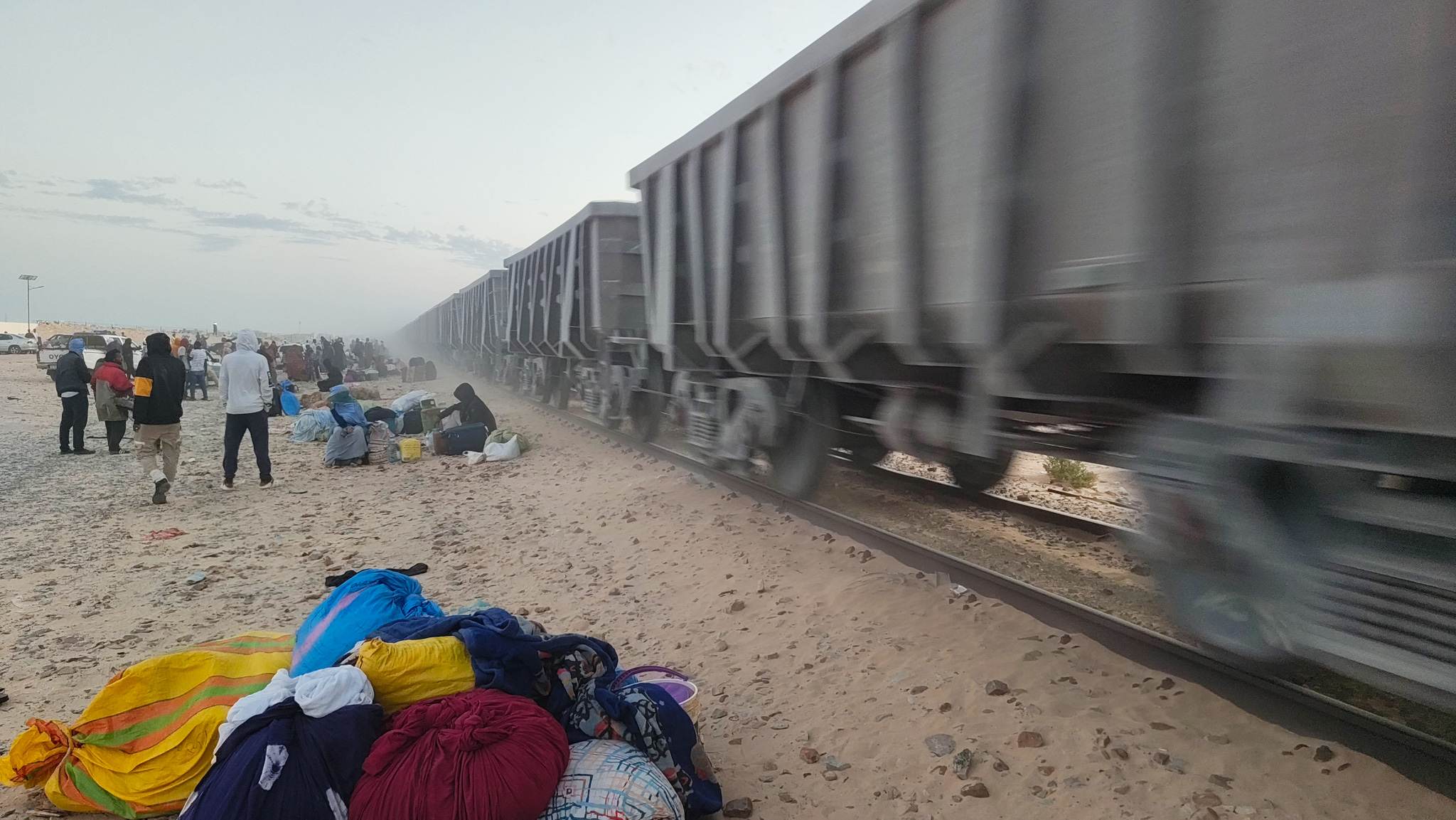 Locals use this train as a form of free public transportation, often carrying large loads inside the empty wagons