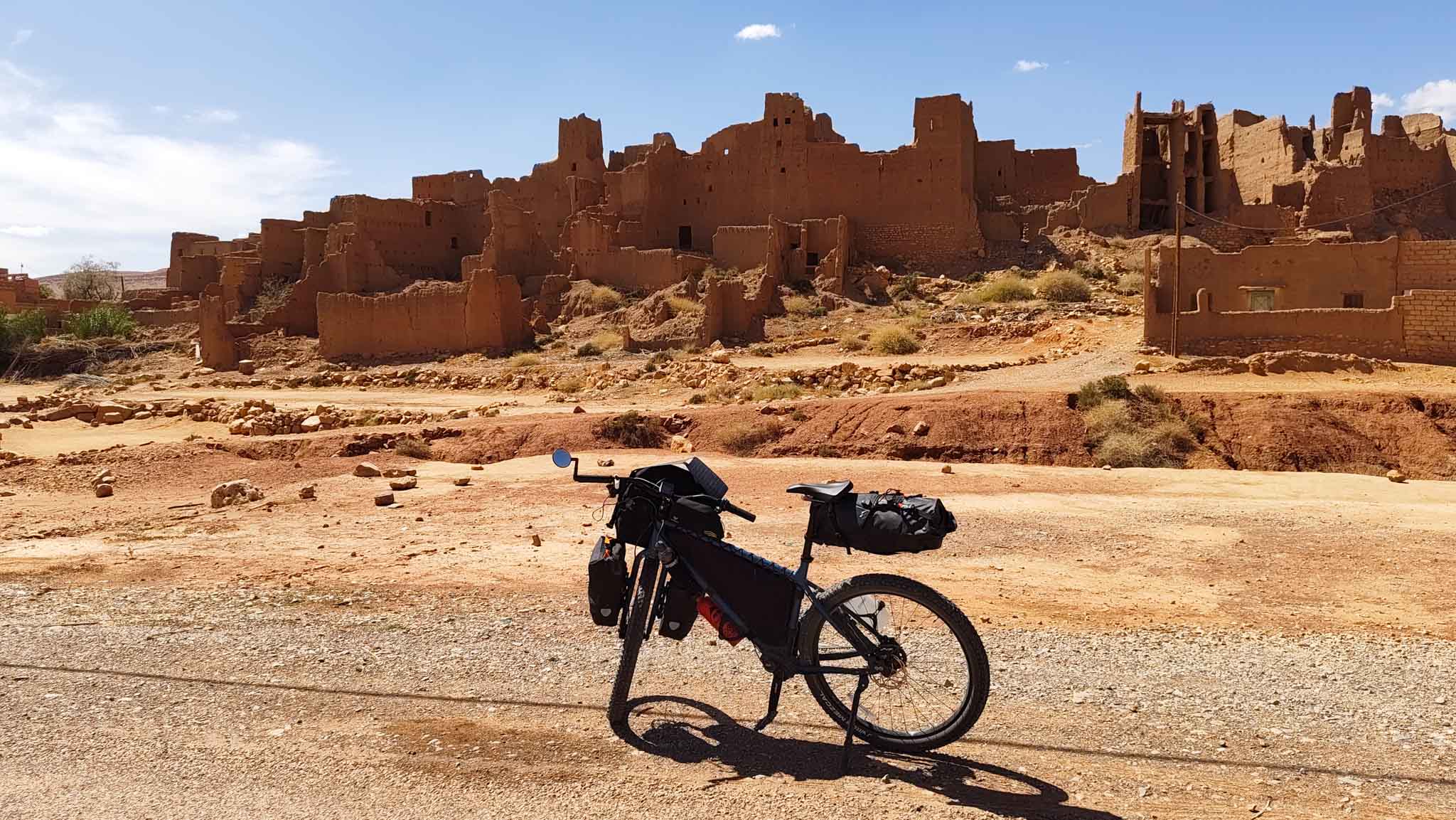 Abandoned mud houses along the way