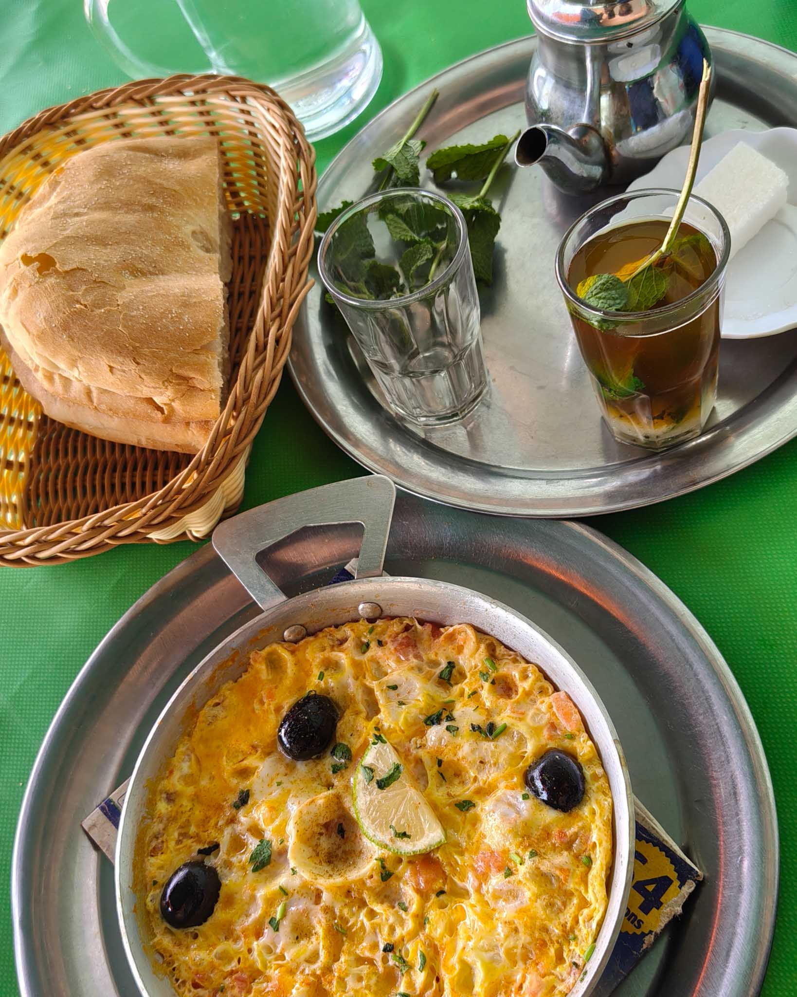Common breakfast: omelettes with olives, bread, and tea