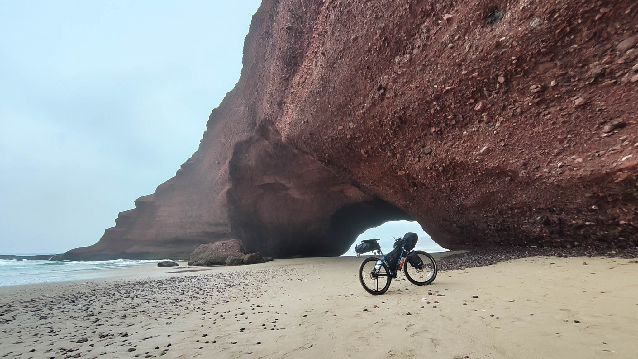 Legzira Beach and the mammoth red sandstone arches