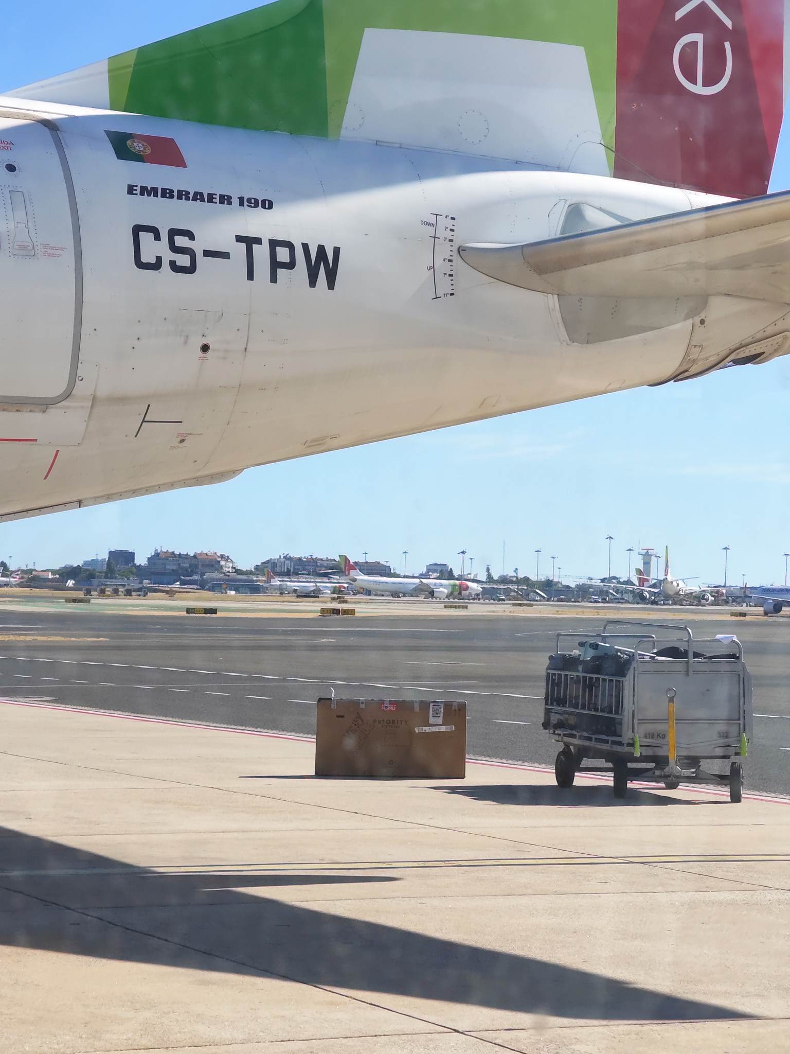 Watching my bike get loaded onto the tiny plane from my window