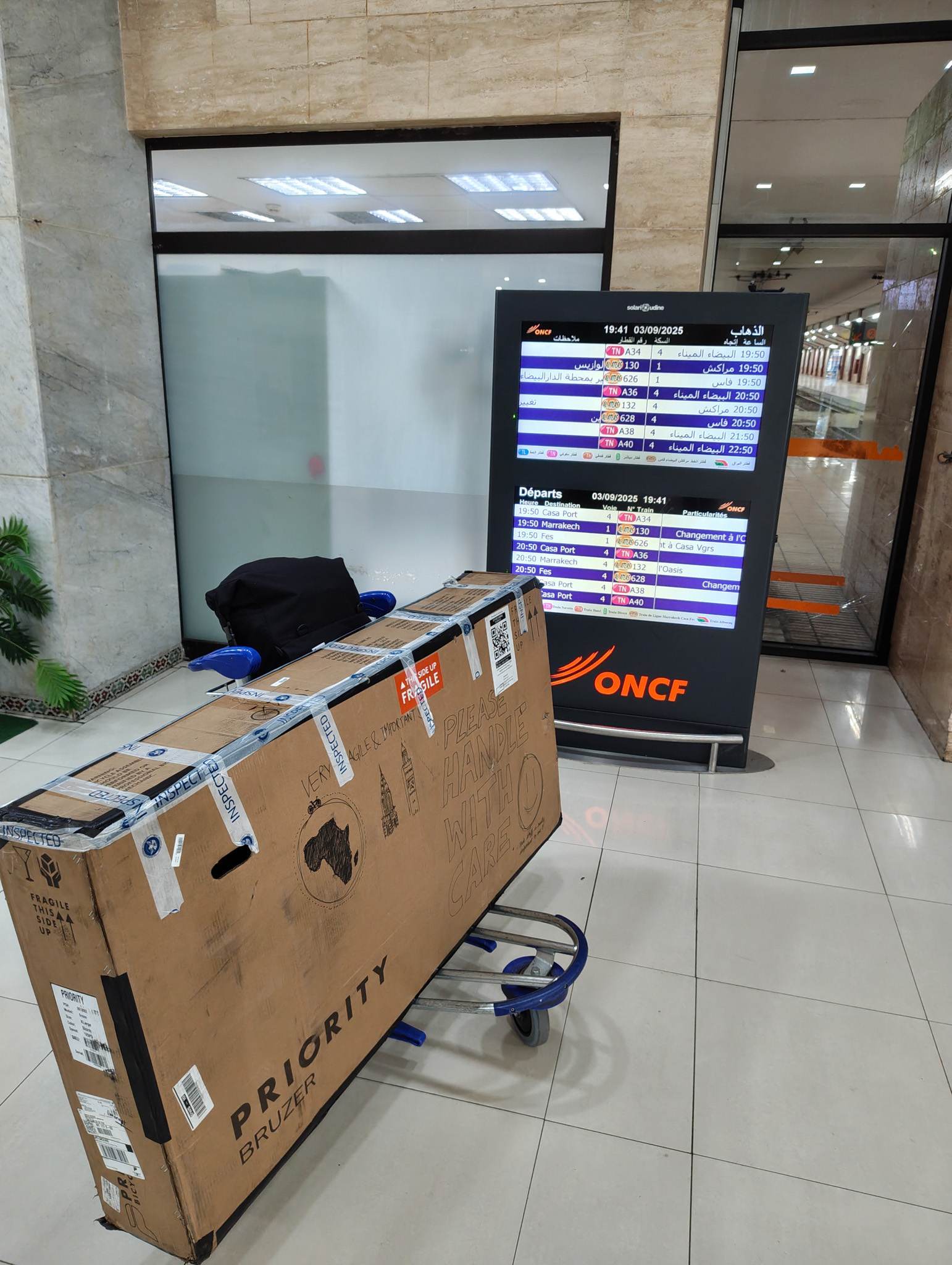 Taking the train in Casablanca. The train station was modern and the trains were clean